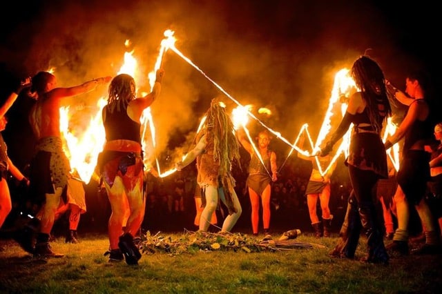 For answers to all your Halloween FAQs, check out <a href="https://headmagazine.com/a-deep-dive-into-the-origin-of-halloween/" target="_blank">“A Deep Dive Into the Origin of Halloween: It’s Not What You Think.”</a> 
Photo of Neopagans in Ireland celebrating Samhain /<a href="https://creativecommons.org/licenses/by-sa/4.0/" target="_blank">CC BY-SA 4.0</a> via <a href="https://commons.wikimedia.org/wiki/File:Samhain_Celebration_Ireland.jpg" target="_blank">Wikimedia Commons</a>.